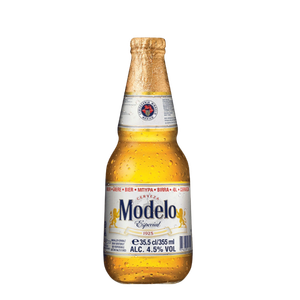 Cerveza Modelo Especial 33 cl en Takeria Olmeka, lager mexicana clara y refrescante, perfecta para acompañar platos tradicionales.