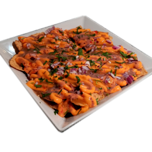 Nachos Salseros en Takeria Olmeka con queso fundido, salsas y toppings tradicionales mejicanos.