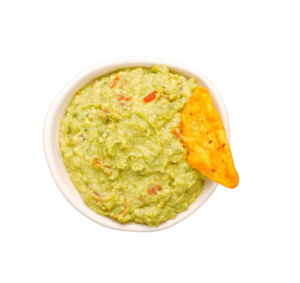 Añade un extra de guacamole en Takeria Olmeka: cremoso, elaborado con aguacate fresco y perfecto para acompañar totopos, quesadillas y platos tradicionales mexicanos en Vallecas.